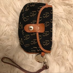 dooney and bourke wristlet  never used